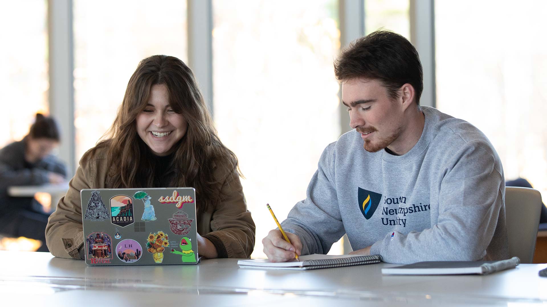 Two students studying with each other.