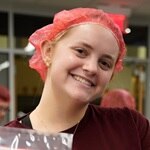 SNHU student Alyssa Parkinson ’28 participating in community service through the Chandler Center.