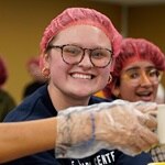 SNHU student Mikayla Harris ’27 participating in community service through the Chandler Center.