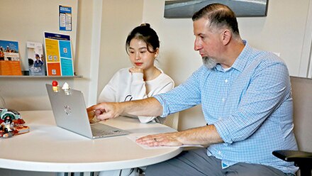 A student working with a Career Advisor