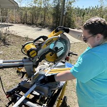 An SNHU student in Valdosta, Georgia doing hands-on service work.