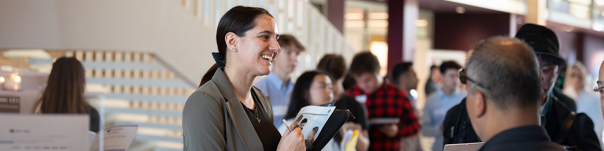 A group of people at a job fair
