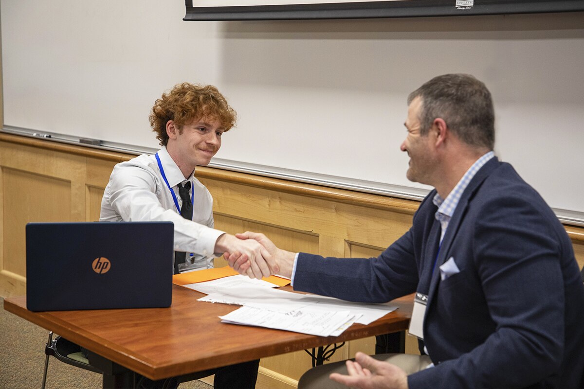 Student participating real-world role-play scenario to test their business instincts at SNHU's Internal Sales Competition.