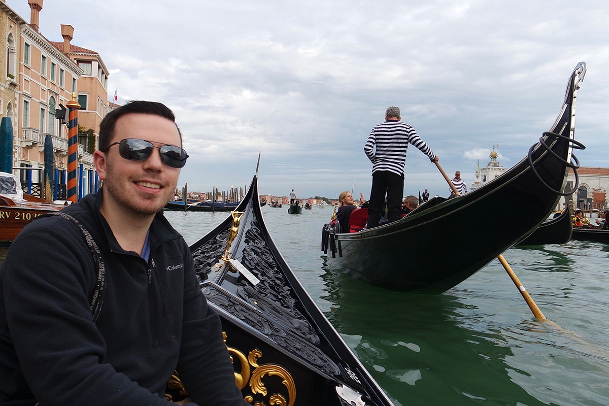 SNHU student enjoying gondola ride in Italy during study abroad program.